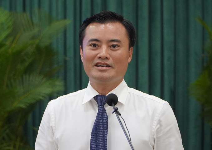 Phó chủ tịch UBND TP HCM Bùi Xuân Cường nói tại hội nghị, ngày 14/12. Ảnh: Gia Minh